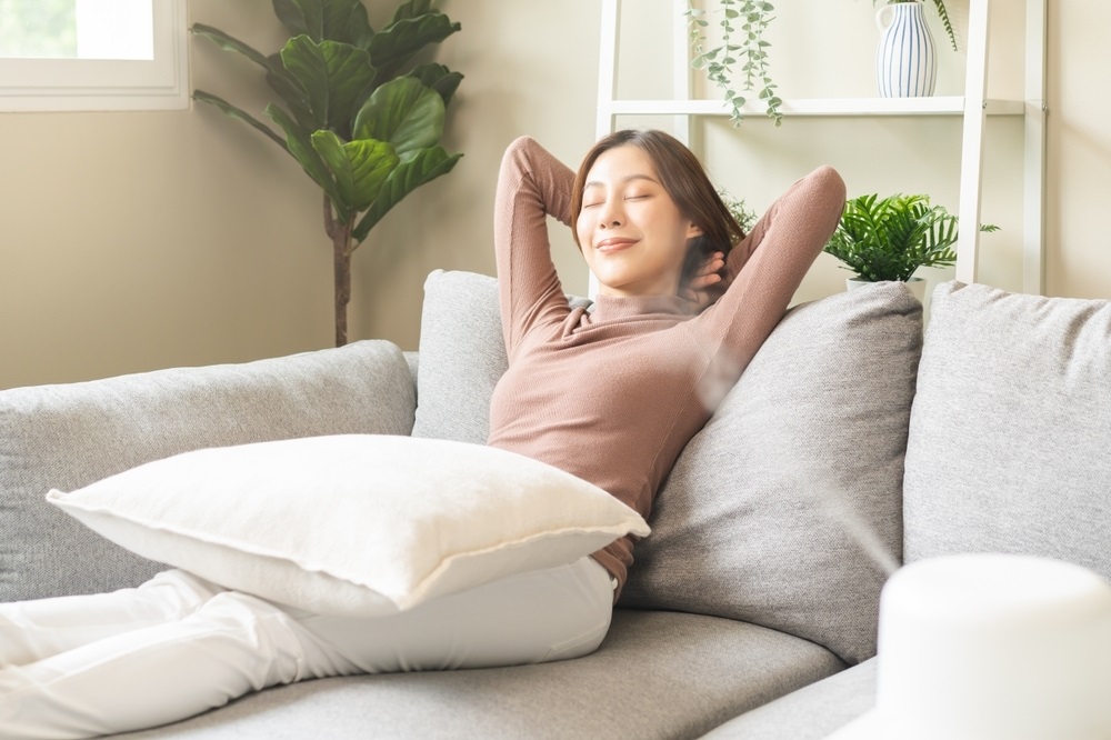 happy asian young woman, girl enjoying aromatherapy steam scent